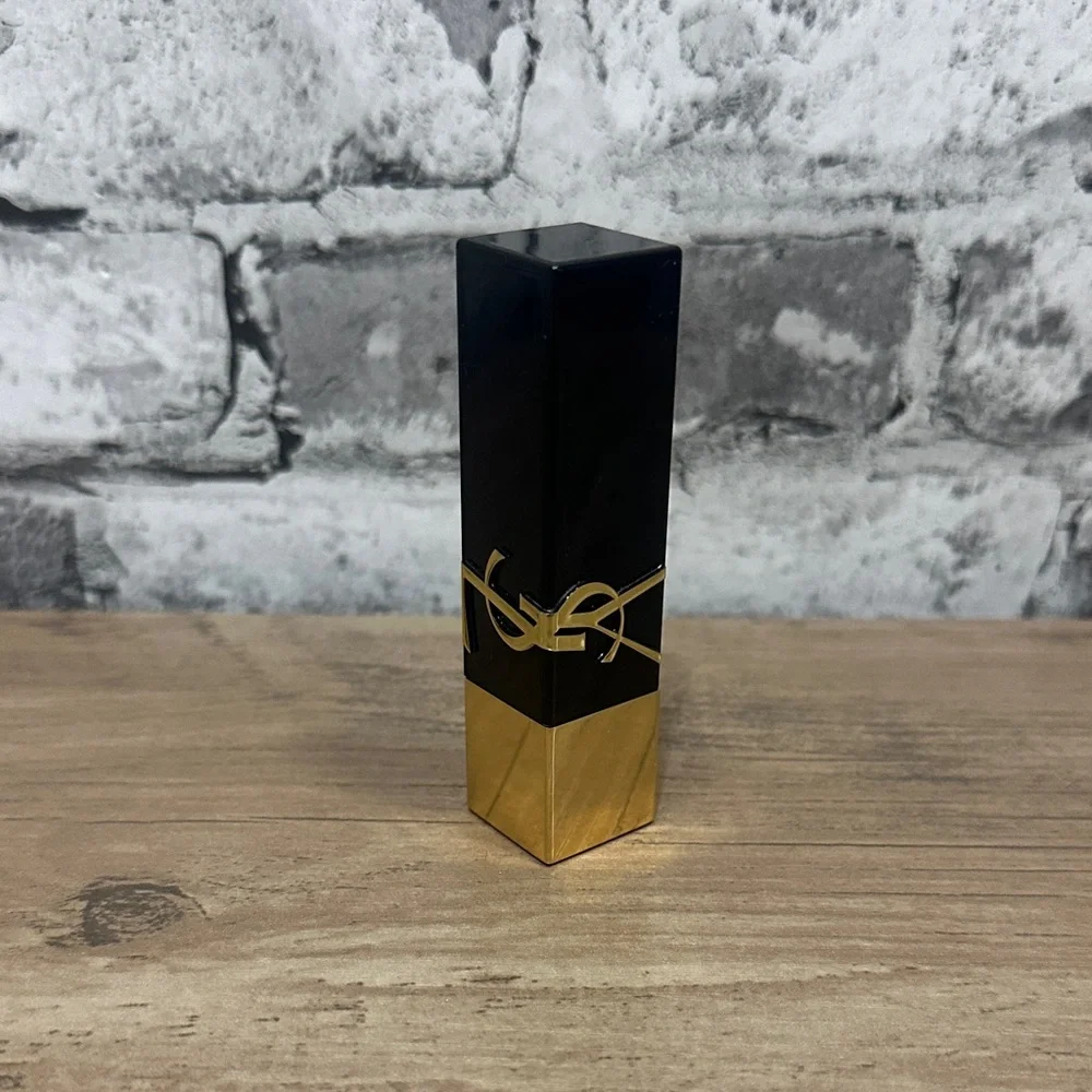 EUC Yves Saint Laurent Black and Gold Lipstick